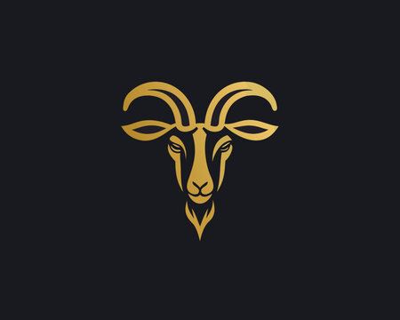 golden ram head logo stylized animal emblem on black background