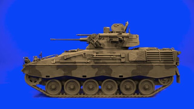 A detailed 3D render of an M2 Bradley infantry fighting vehicle finished in desert tan camouflage, stationed against a solid blue screen background. This high-quality static visual effects element is 