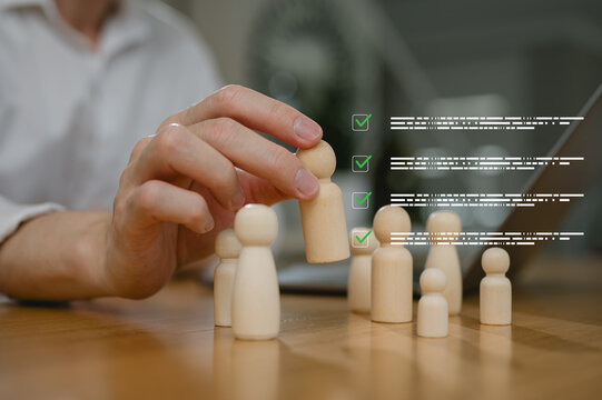 Concept of leader in success team, human resource manager analysing organisation team. choosing head of project manager, Assessment of skills, development and improvement working with ai