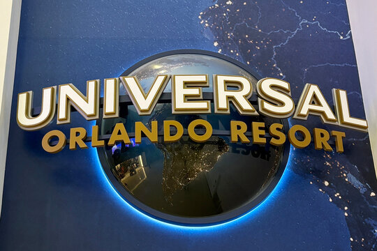 A sign for Universal Orlando Resort Theme Parks at Orlando International Airport in Orlando, Florida on May 18, 2026.