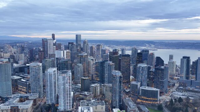 7th of February 2026 Drone flight above the Seattle downtown skyline with Amazon Spheres and modern office towers at blue hour, Washington USA. g.