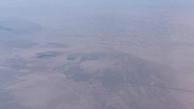 Desert Landscape High Altitude View From a Passenger Plane