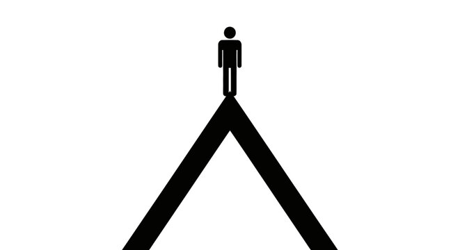 Person standing on a mountain peak