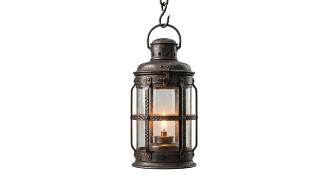 Vintage hanging metal lantern with a glowing candle, isolated on a white background.