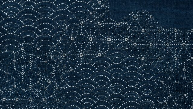 Japanese sashiko stitching pattern on indigo dyed fabric texture