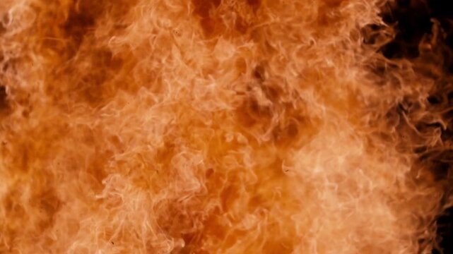 Bright intense orange fire flames Suitable for backgrounds, design projects, or publications needing fiery, energetic visuals for themes like heat, power, intensity, and passion.