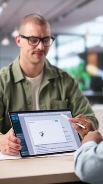 Person Using Tablet To Sign Legal Contract