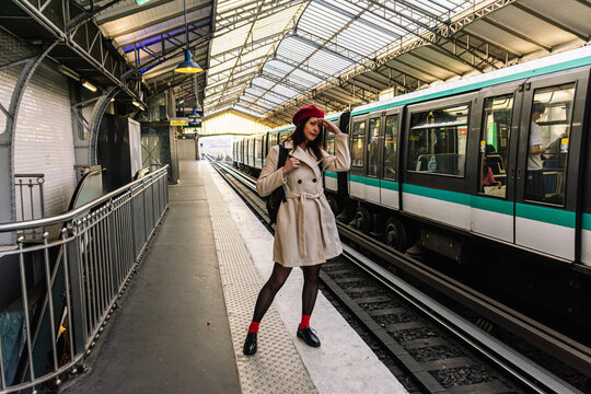 Solo woman traveling in paris metro system