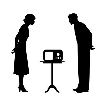 1920s Couple Silhouette listening to a Vintage Radio
