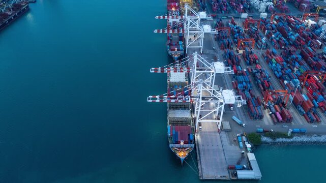 Timelapse unloading Cargo container box to Trucks in Shipyard Cargo Container Sea Port Freight forwarding service logistics and transportation. International Shipping Depot Custom Port import export