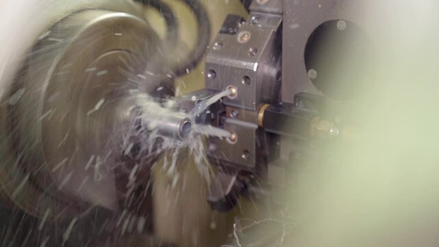 Lathe industrial turning machine operation. Cnc milling machine in operation with metal gear. Precision alignment ensures secure clamping.