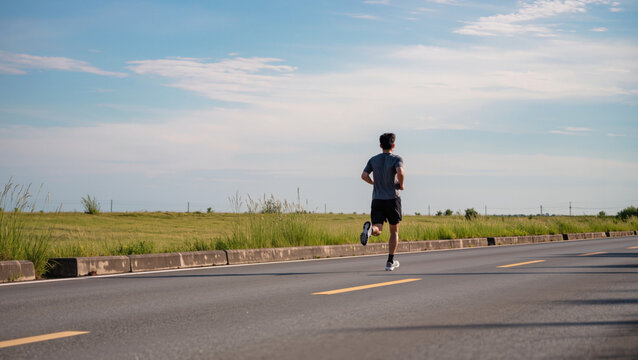 Urban Fitness Routine
​Running Along the City Park
​Morning Jog on Asphalt Road
​Road Training Session
​City Runner Perspective
​Speed and Endurance Workout
​Athletic Stride on the Street
