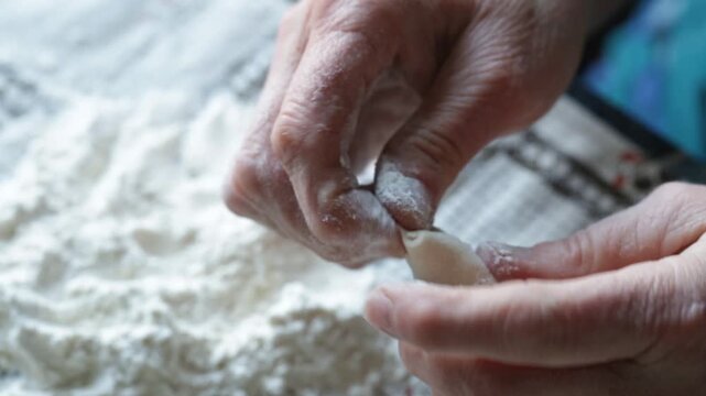 Making potato dumplings at home, close-up view, home cooking