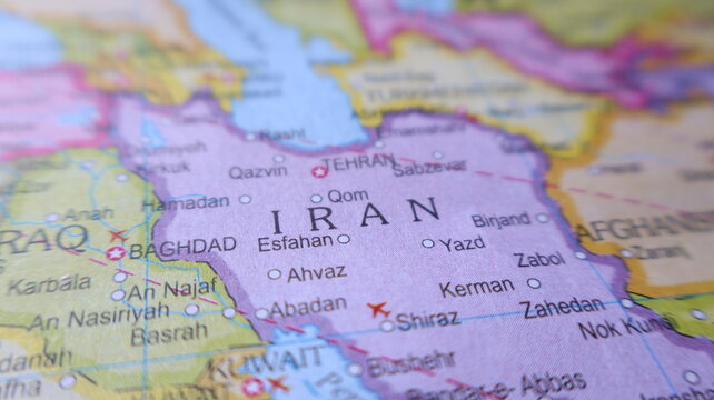 Detailed view of a political world map focusing on Iran, Iraq, Kuwait, and surrounding regions, showing cities and borders.