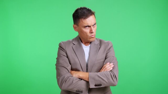 Angry serious businessman crossing his arms shaking her head no