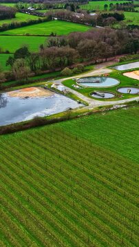 Treating industrial wastewater discharging environmental processes