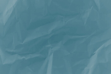 Obraz premium Crushed blue paper texture with soft light and copy space for design