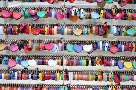 May 04, 2024: Osaka, Japan. Colorful love locks on a metal fence at umeda sky building, famous landmark in Japan.