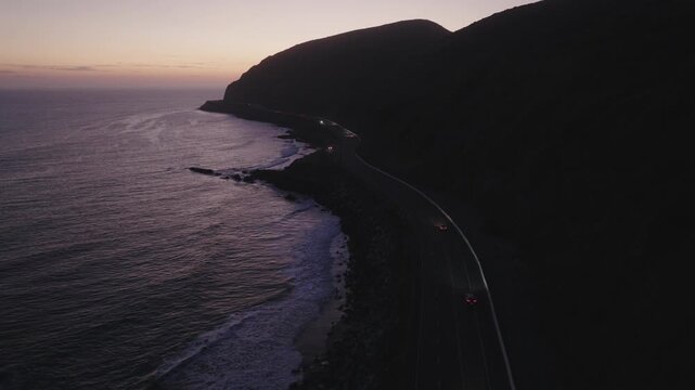 Dusk Car Tracking Winding Oceanside Pacific Coast Highway PCH Aerial 