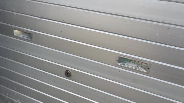 Closed steel rolling door of commercial shop