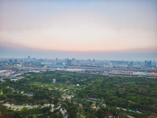 Fototapeta premium Urban sunrise over cityscape aerial view of nature and buildings landscape photography