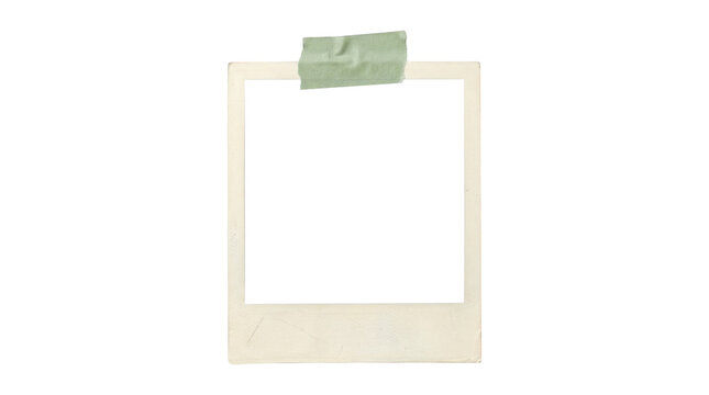 A blank polaroid photo with green tape on a transparent background
