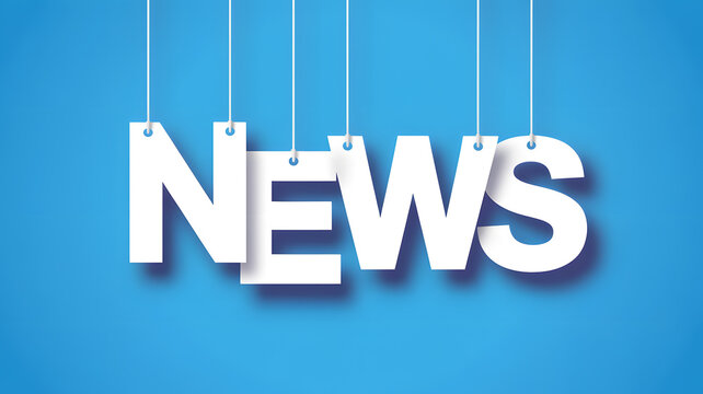 A large white news sign hanging from strings against a blue background