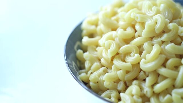 Soft boiled macaroni pasta served, ready for a simple and satisfying meal.