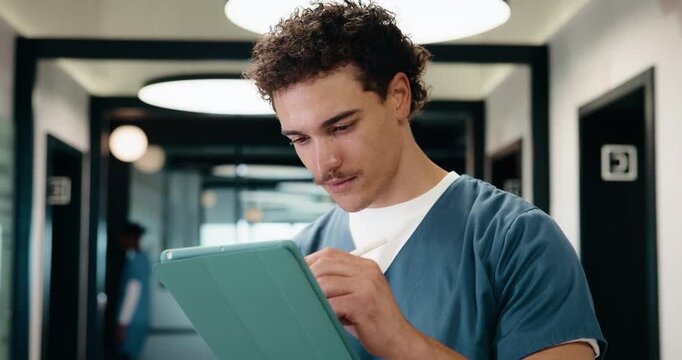 Nurse, pen and man with tablet for healthcare history, records or admin information in hallway. Tech, person or medical worker with stylus at hospital for schedule update, reading email or telehealth