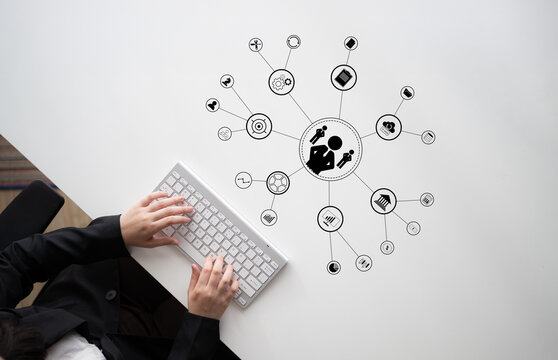 A concept of centralized business management and corporate strategy. A leadership team connecting to all functions like finance, operations, and planning. Motif
