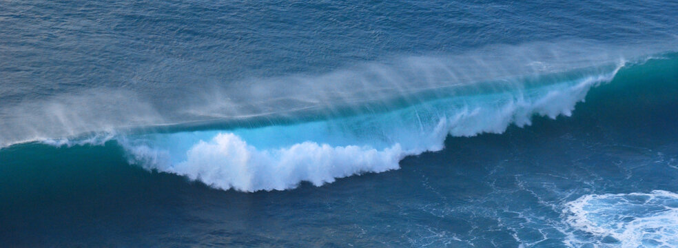 Banner Tropical sea beach Seascape dark background wave splash on rock. Seascape dark ocean background wave splash on rock. Water Surface blue wave pattern. Tropical sea beach in summer seaside
