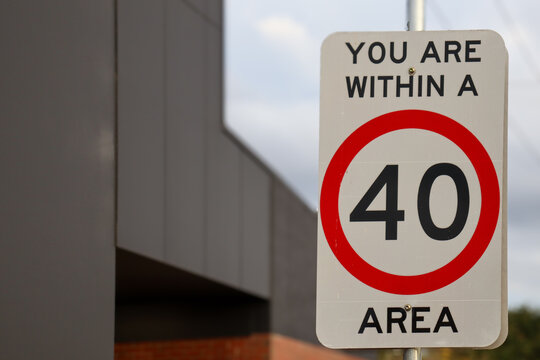 slow speed limit sign 40 in city street