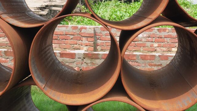 Industrial metal pipe stack with strong geometric texture