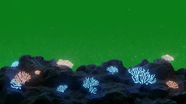 Vibrant glowing coral formations illuminate a dark underwater seabed with green screen chroma key background.