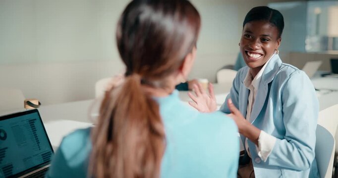 High five, boardroom and business women in meeting for finance review, planning or funding proposal. Laptop, corporate and people with success for financial analysis, profit growth and investment
