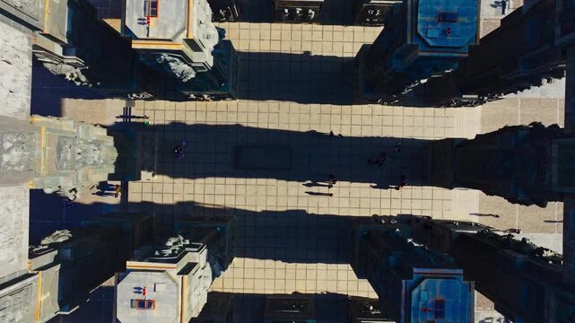 Aerial drone view of the Chronicles of Georgia monument in Tbilisi featuring massive stone pillars, historic reliefs and panoramic landscapes.