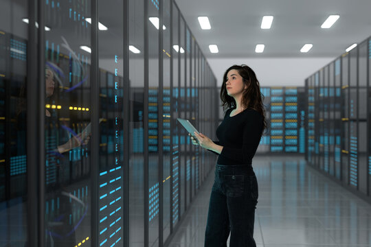 3D data center engineer reviews server rack with tablet