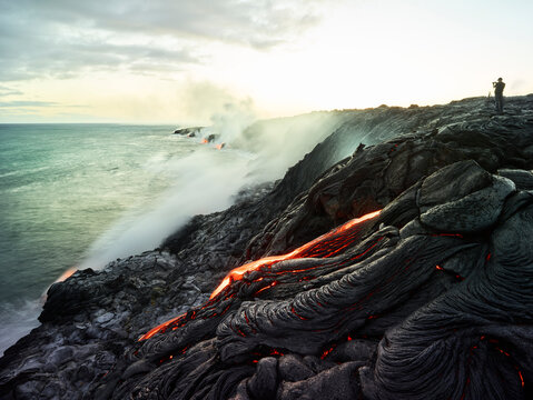 Hawaii, Big Island, Hawai'i Volcanoes National Park, lava flowing into pacific ocean, photographer
