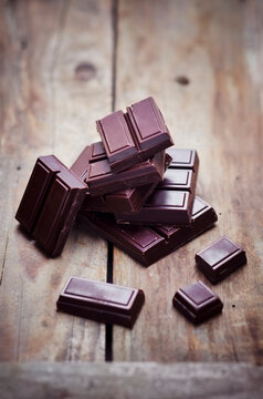 Bittersweet chocolate on wood
