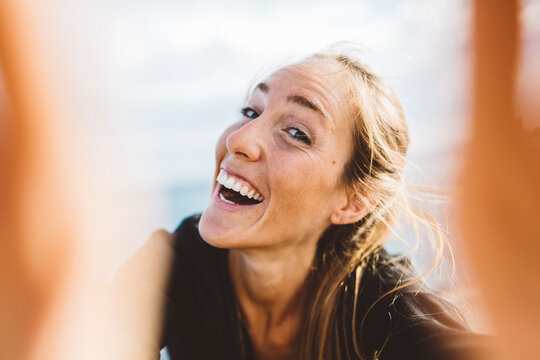 Selfie of happy young woman