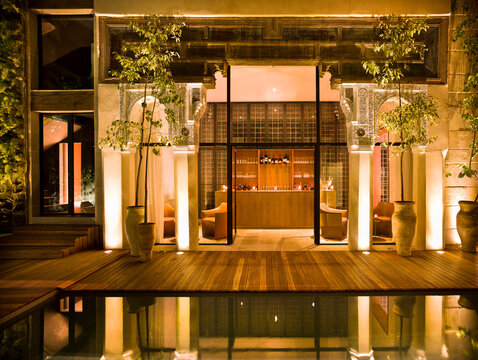 Morocco, Fes, Hotel Riad Fes, courtyard with swimming pool by night