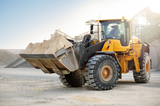 Digger working at quarry