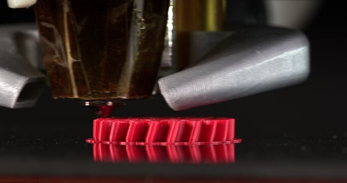 Gear 3D printing process. Printing on a сartesian kinematics printer. Close-up footage 4k.