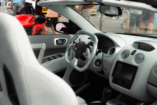 Ukraine, Kyiv - 20 October 2023. Kyiv Car Fest Chevrolet Sonic car interior. View from the driver in the car.