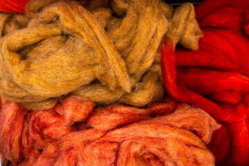 Warm colored wool fleece texture in red orange and brown shades © were