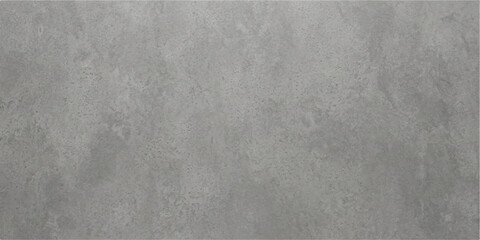 Fototapeta premium A textured, mottled gray concrete surface, offering a minimalist and industrial aesthetic for various design applications.