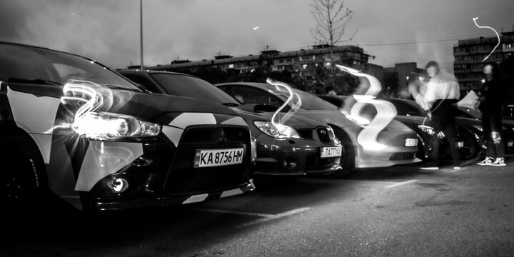 Kyiv, Ukraine - October 20, 2023. Modified cars lined up outdoors at Kyiv Car Fest, an automotive event featuring tuned vehicles, sports cars, and car enthusiast culture in Kyiv.