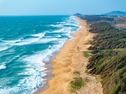 aerial view of waves on the beach