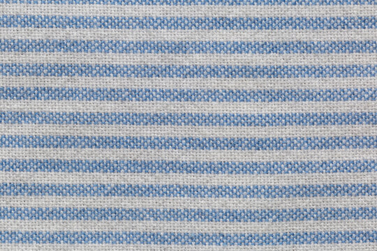 macro of blue and white fabric linen striped texture