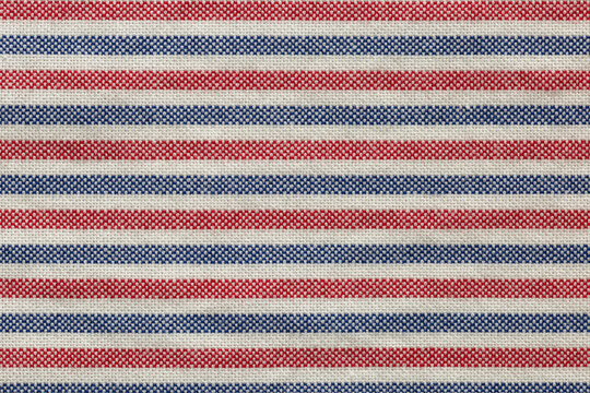 macro of blue, red  and white fabric linen striped texture